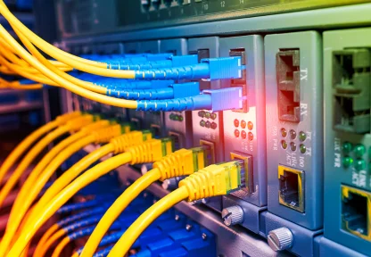 Network cables connected to commercial networking equipment in Dubai